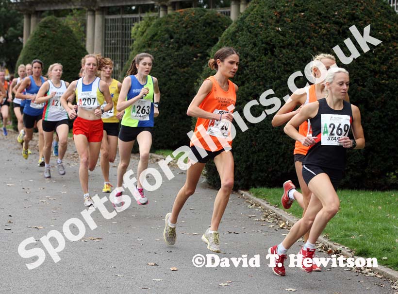 Jennifer Meadows (Wigan and District AC) leads from Rosie Smith (Durham City) on the first leg of the Northern Womens 4 Stage Road Relay.
